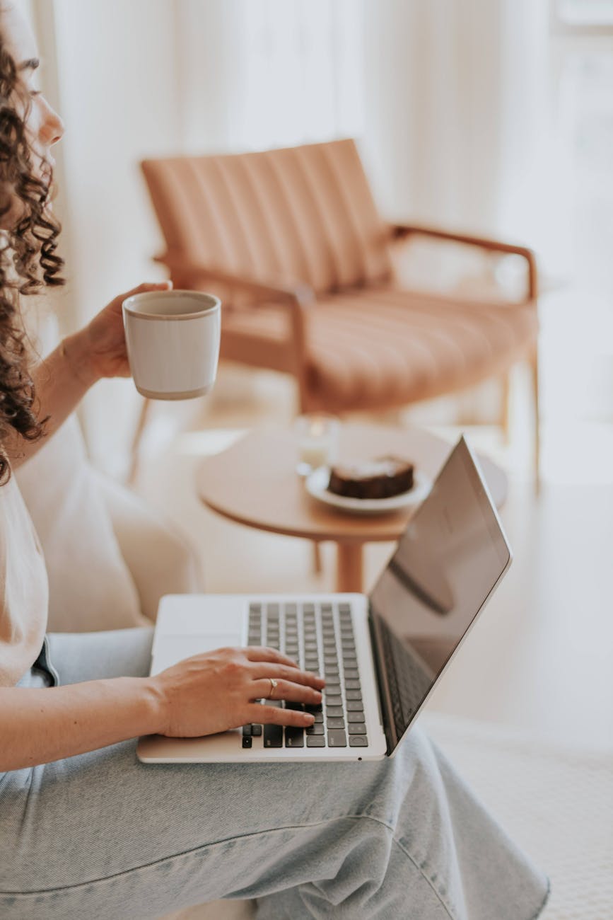 cozy home office setup with laptop and coffee